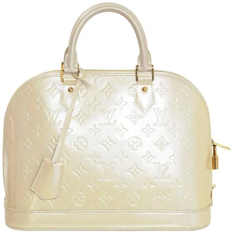 alma louis vuitton beige|authentic louis vuitton alma handbag.